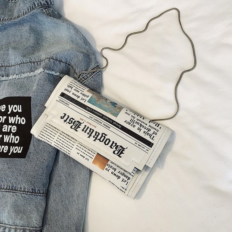 Newspapers modeling day clutch - Flap Bag Envelope review and price