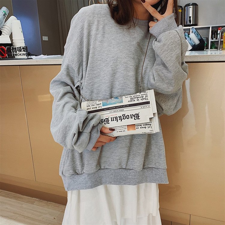 Newspapers modeling day clutch - Flap Bag Envelope review and price